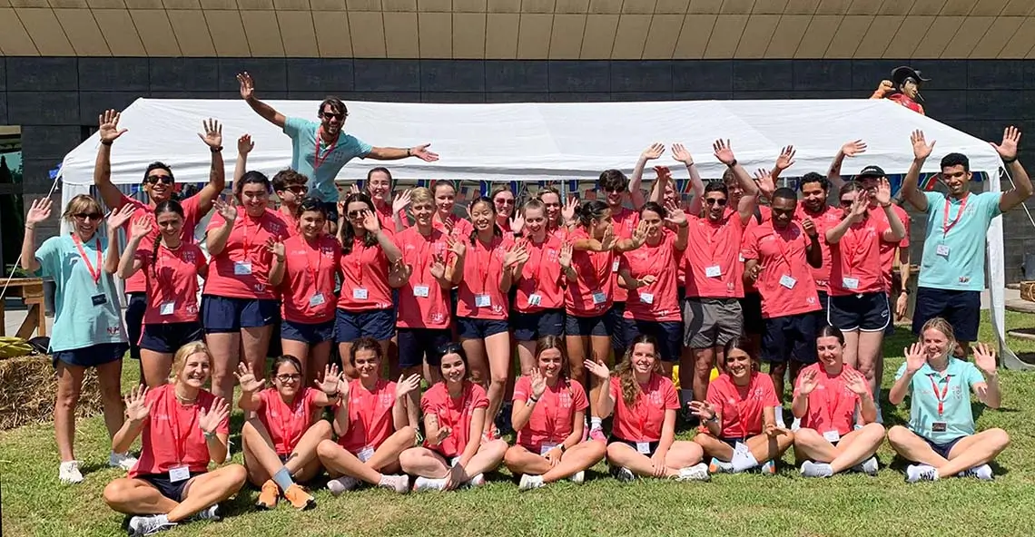 Group of international and bilingual coaches at the summer camp in Spain International and bilingual coaches greeting at the summer camp in Spain